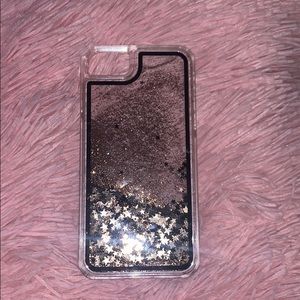 Gold and Black glitter iPhone 6s phone case.